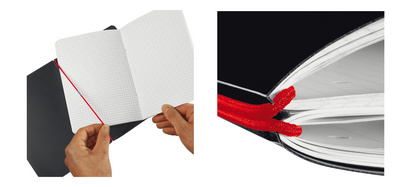 Symbolbild: Papier einlegen - Haltegummi